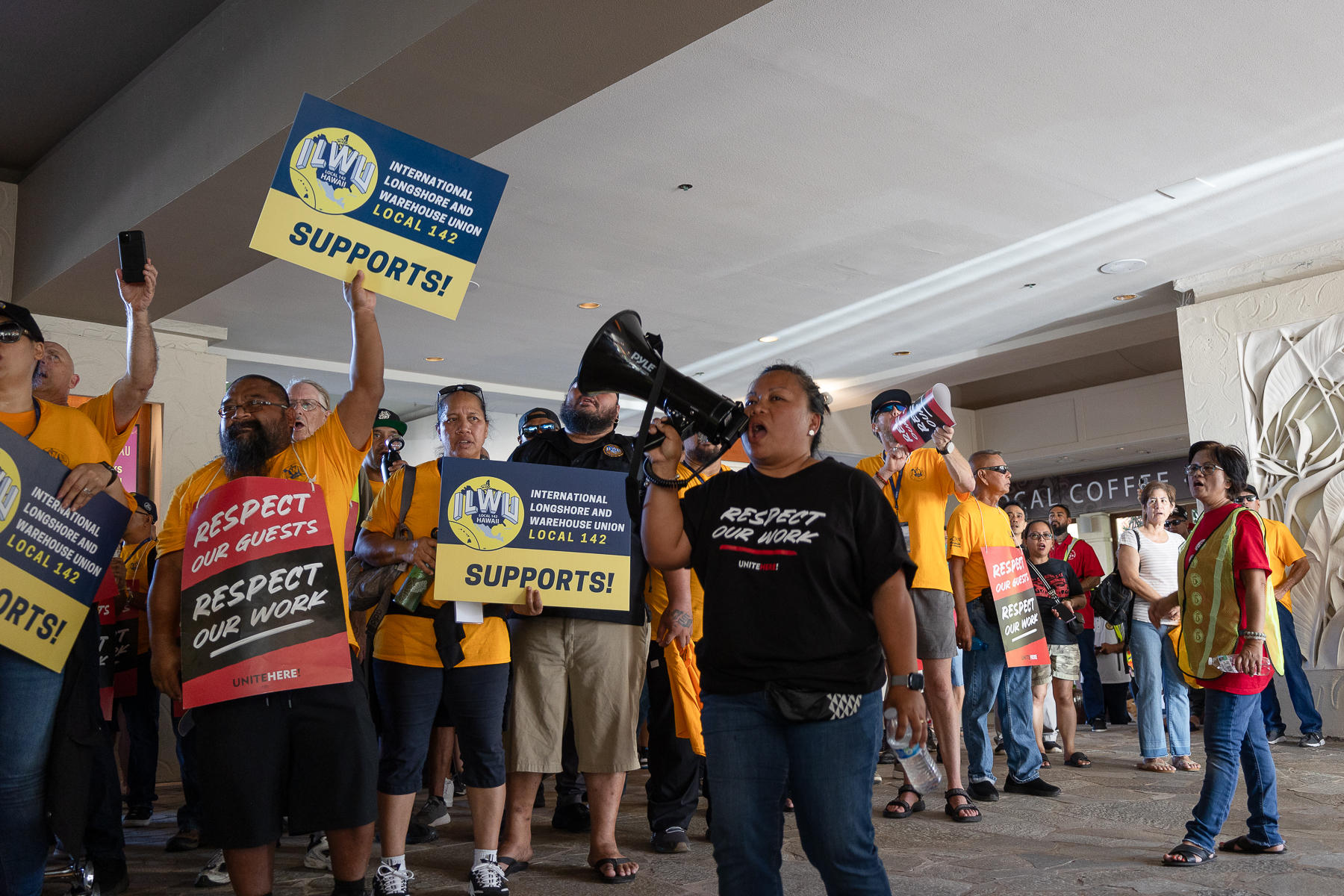 Union members fill the lobby of the Hilton Hawaiian Village